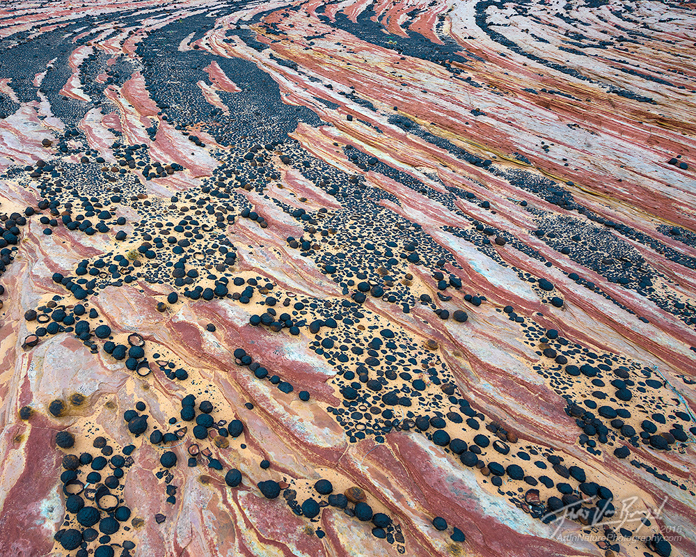 Moqui Marbles adorn a sandstone plateau in Utah's Escalante National Monument.