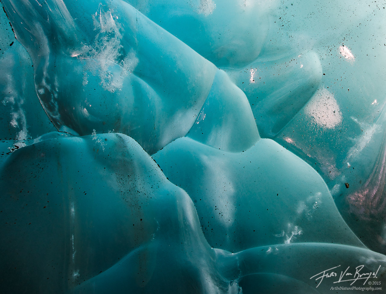 Surreal colors and forms decorate the interior of a cave in the Mendenhall Glacier near Juneau, Alaska.