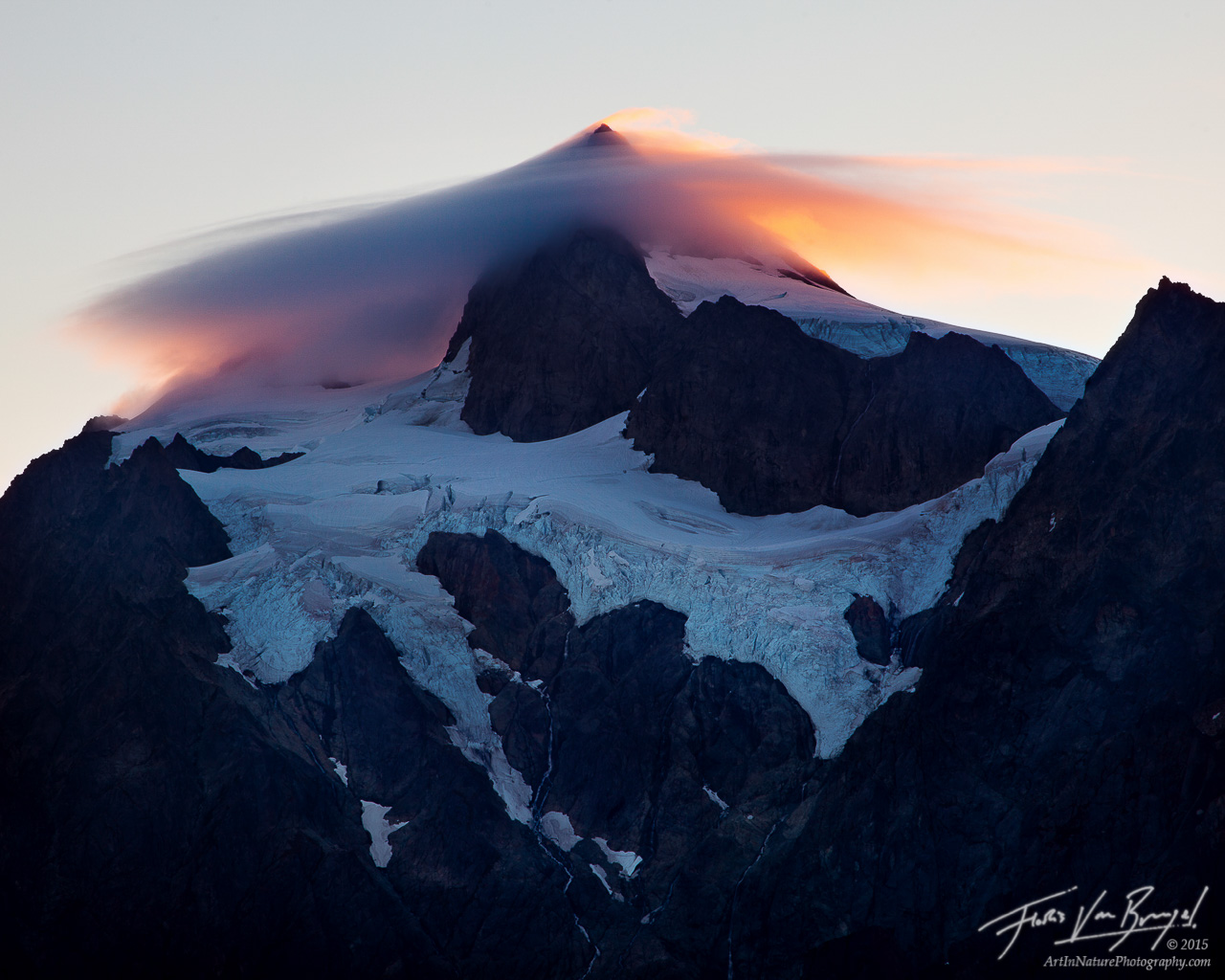 A lenticular cloud forms over the summit of Mt Shuksan in Washington's North Cascades.